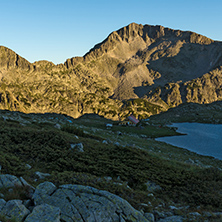 Sunset landscape with Kamenitsa peak and Tevno lake, Pirin Mountain, Bulgaria