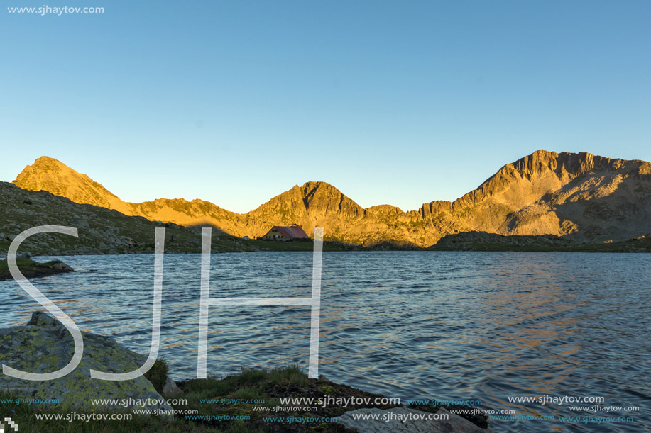 Sunset landscape with Kamenitsa peak and Tevno lake, Pirin Mountain, Bulgaria