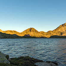 Sunset landscape with Kamenitsa peak and Tevno lake, Pirin Mountain, Bulgaria