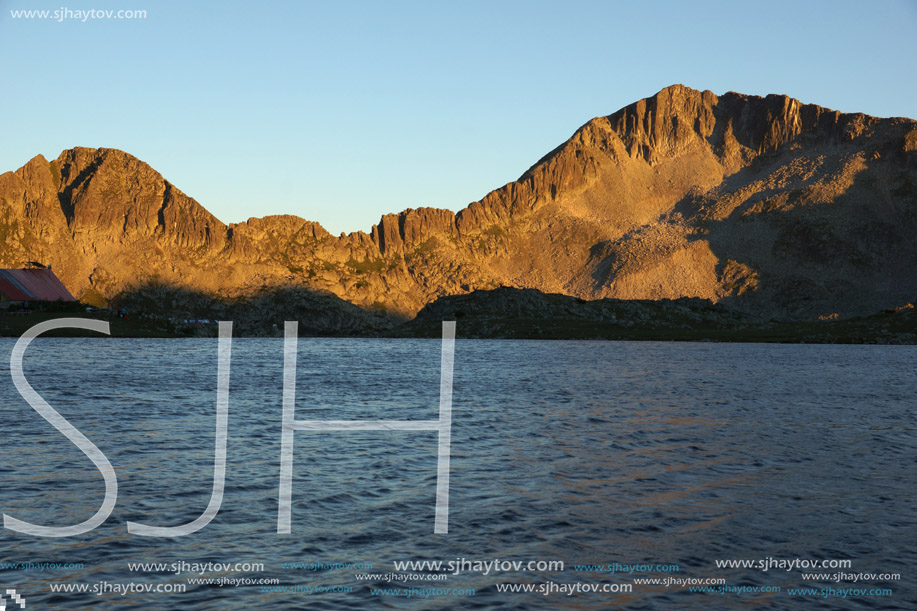 Sunset landscape with Kamenitsa peak and Tevno lake, Pirin Mountain, Bulgaria