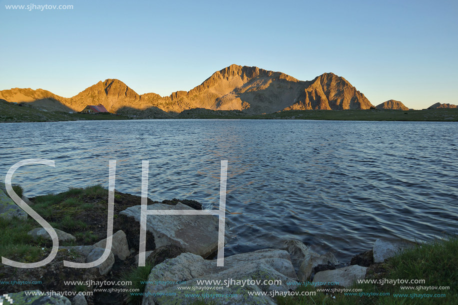 Sunset landscape with Kamenitsa peak and Tevno lake, Pirin Mountain, Bulgaria