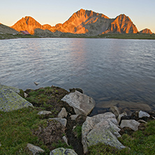 Sunset landscape with Kamenitsa peak and Tevno lake, Pirin Mountain, Bulgaria