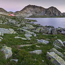 Sunset landscape with Kamenitsa peak and Tevno lake, Pirin Mountain, Bulgaria