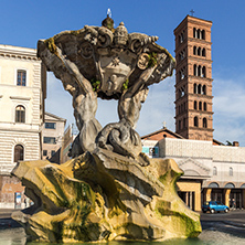 ROME, ITALY - JUNE 22, 2017:  Amazing view of Church of Santa Maria in Cosmedin and Fountain of the Tritons in city of Rome, Italy