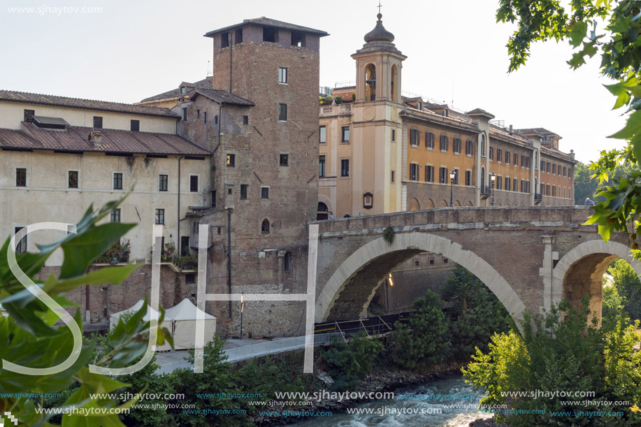 ROME, ITALY - JUNE 22, 2017: Amazing view of Castello Caetani, Tiber River and Pons Fabricius in city of Rome, Italy