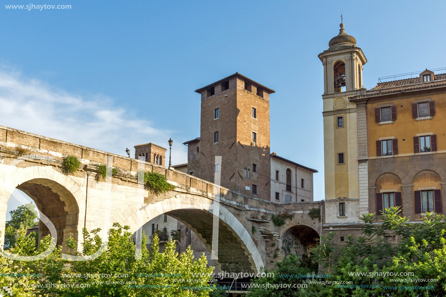 ROME, ITALY - JUNE 22, 2017: Amazing view of Castello Caetani, Tiber River and Pons Fabricius in city of Rome, Italy