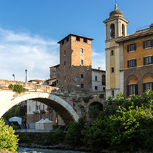 ROME, ITALY - JUNE 22, 2017: Amazing view of Castello Caetani, Tiber River and Pons Fabricius in city of Rome, Italy