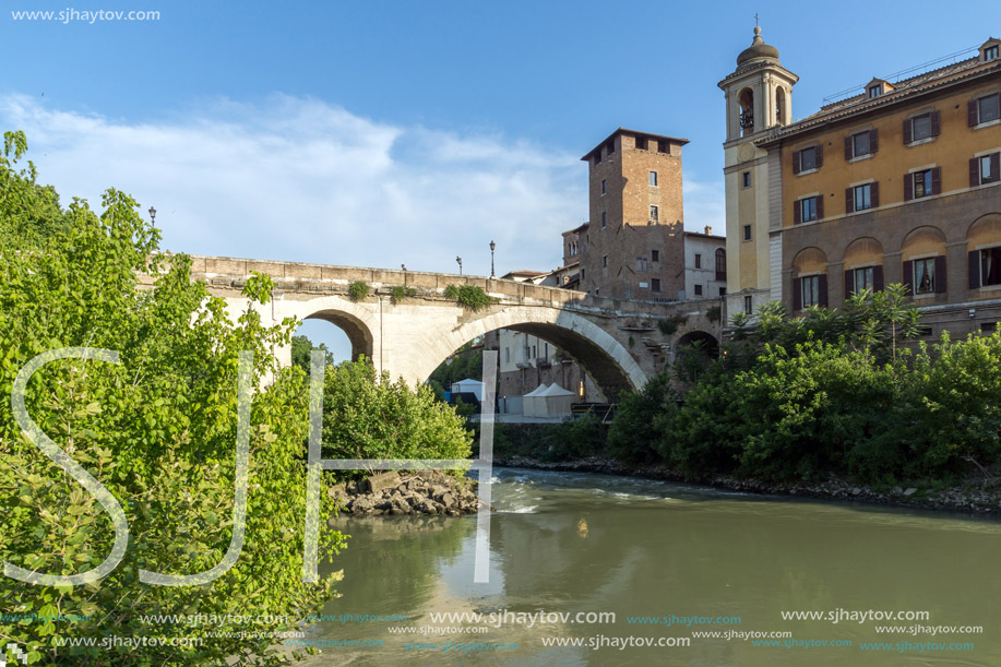 ROME, ITALY - JUNE 22, 2017: Amazing view of Castello Caetani, Tiber River and Pons Fabricius in city of Rome, Italy