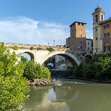 ROME, ITALY - JUNE 22, 2017: Amazing view of Castello Caetani, Tiber River and Pons Fabricius in city of Rome, Italy