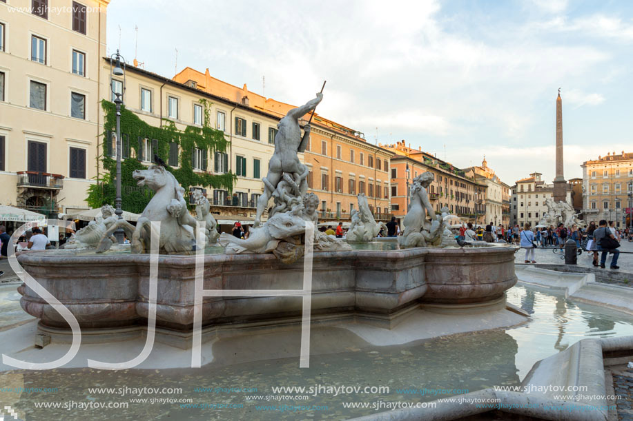 ROME, ITALY - JUNE 22, 2017: Tourists are strolling at the sunset in a Piazza Navona in city of Rome, Italy
