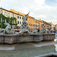 ROME, ITALY - JUNE 22, 2017: Tourists are strolling at the sunset in a Piazza Navona in city of Rome, Italy