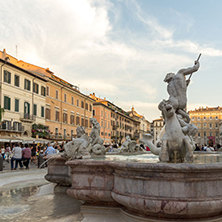 ROME, ITALY - JUNE 22, 2017: Tourists are strolling at the sunset in a Piazza Navona in city of Rome, Italy