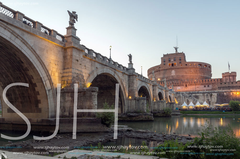 Amazing Sunset view of St. Angelo Bridge and castle st. Angelo in city of Rome, Italy