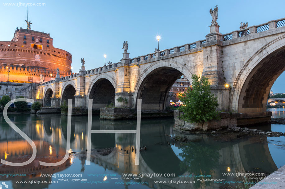 Amazing Sunset view of St. Angelo Bridge and castle st. Angelo in city of Rome, Italy