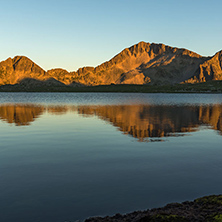 Amazing red Sunset landscape of Tevno lake, Pirin Mountain, Bulgaria