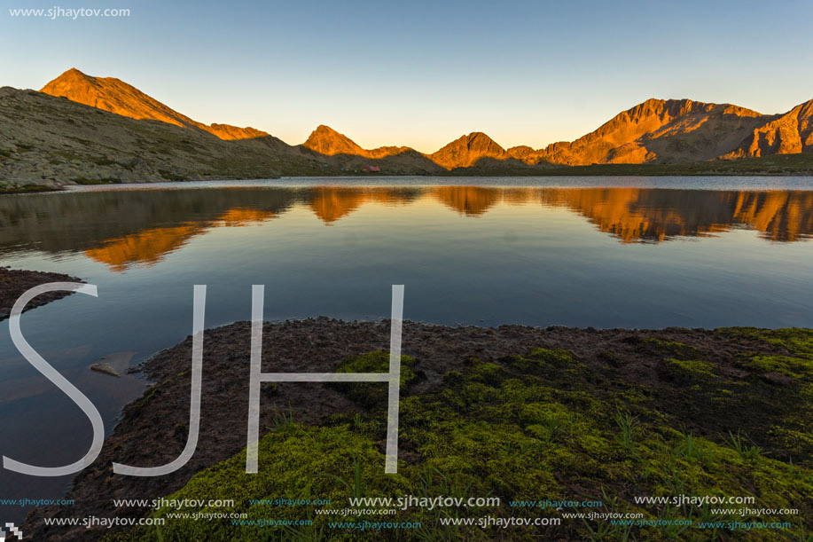 Amazing red Sunset landscape of Tevno lake, Pirin Mountain, Bulgaria