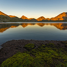 Amazing red Sunset landscape of Tevno lake, Pirin Mountain, Bulgaria