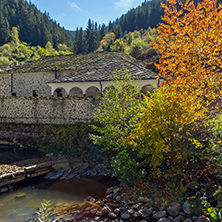 Autumn view of a nineteenth-century church of the Assumption in town of Shiroka Laka, Smolyan Region, Bulgaria