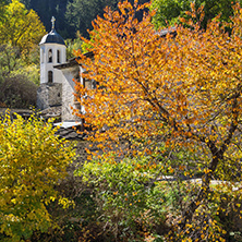 Autumn view of a nineteenth-century church of the Assumption in town of Shiroka Laka, Smolyan Region, Bulgaria