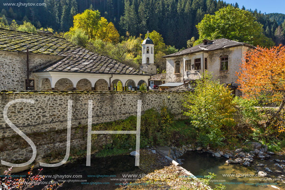 Autumn view of a nineteenth-century church of the Assumption in town of Shiroka Laka, Smolyan Region, Bulgaria