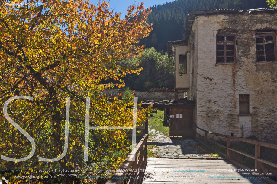 Autumn view of a nineteenth-century church of the Assumption in town of Shiroka Laka, Smolyan Region, Bulgaria