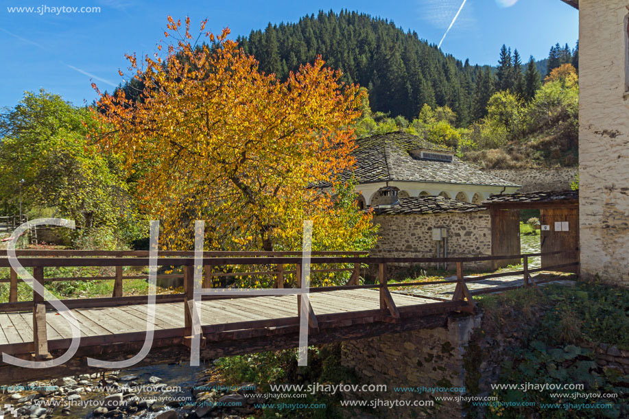 Autumn view of a nineteenth-century church of the Assumption in town of Shiroka Laka, Smolyan Region, Bulgaria