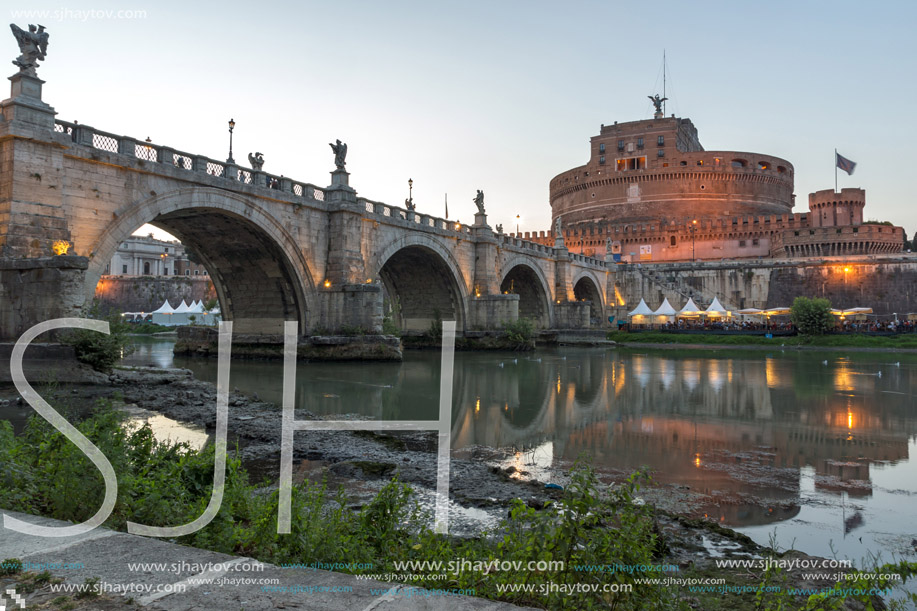 ROME, ITALY - JUNE 22, 2017: Amazing Sunset view of St. Angelo Bridge and castle st. Angelo in city of Rome, Italy