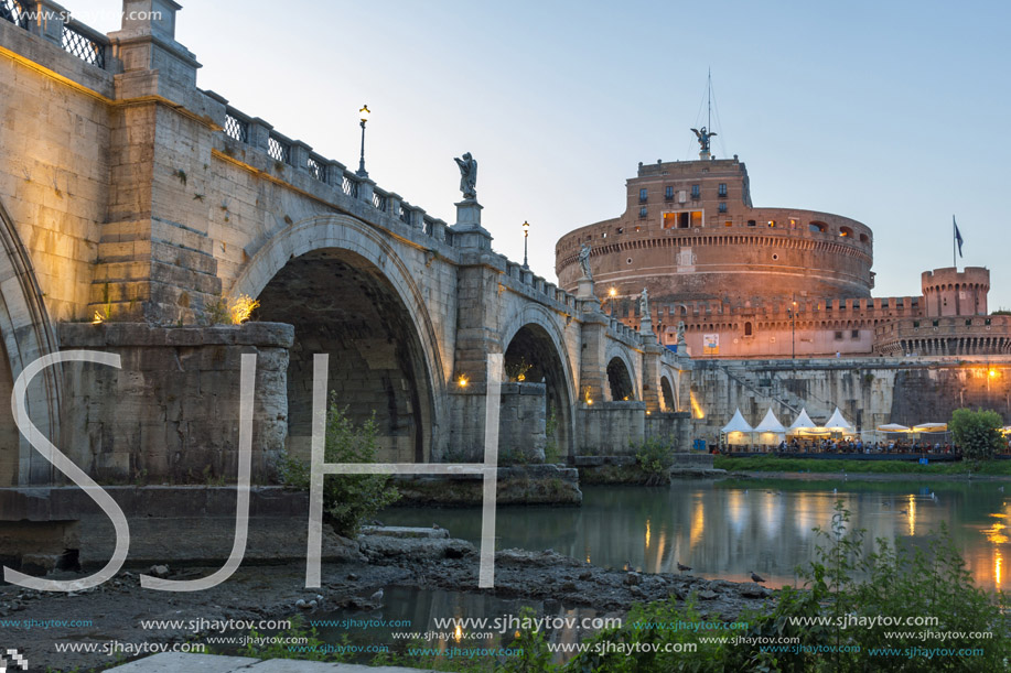 ROME, ITALY - JUNE 22, 2017: Amazing Sunset view of St. Angelo Bridge and castle st. Angelo in city of Rome, Italy