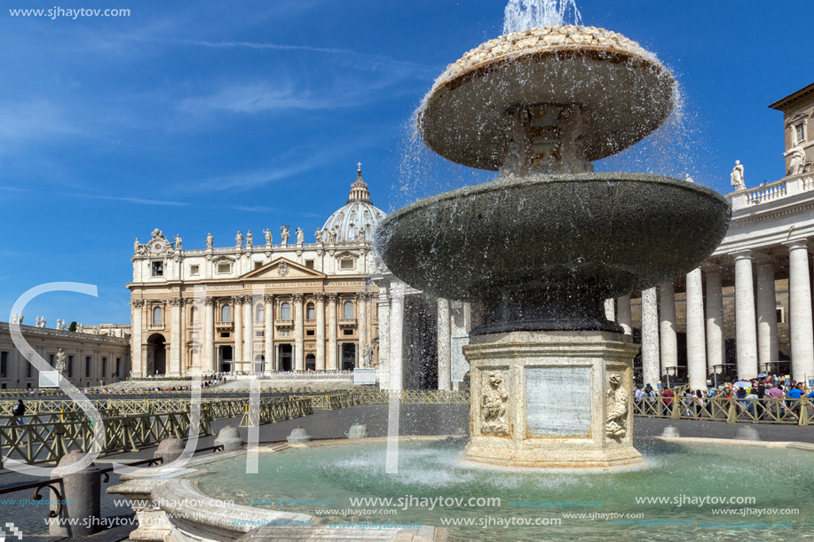 ROME, ITALY - JUNE 23, 2017: Tourists visit Saint Peter"s Square and St. Peter"s Basilica in Rome, Vatican, Italy