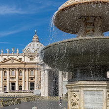 ROME, ITALY - JUNE 23, 2017: Tourists visit Saint Peter"s Square and St. Peter"s Basilica in Rome, Vatican, Italy