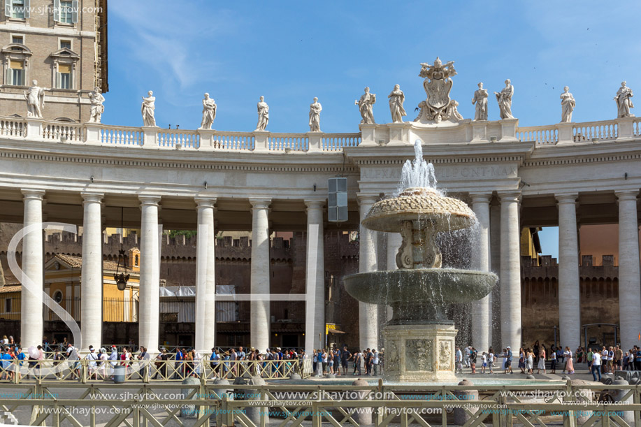 ROME, ITALY - JUNE 23, 2017: Tourists visit Saint Peter"s Square and St. Peter"s Basilica in Rome, Vatican, Italy