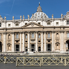 ROME, ITALY - JUNE 23, 2017: Tourists visit Saint Peter"s Square and St. Peter"s Basilica in Rome, Vatican, Italy