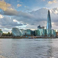 LONDON, ENGLAND - JUNE 15 2016: Sunset Panorama with The Shard skyscraper and Thames river, England, Great Britain