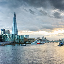 LONDON, ENGLAND - JUNE 15 2016: Sunset Panorama with The Shard skyscraper and Thames river, England, Great Britain