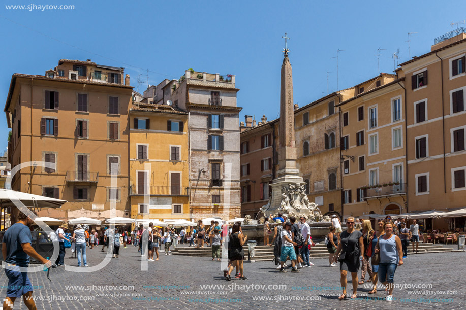 ROME, ITALY - JUNE 23, 2017: People in front of Fountain in front of Pantheon in city of Rome, Italy