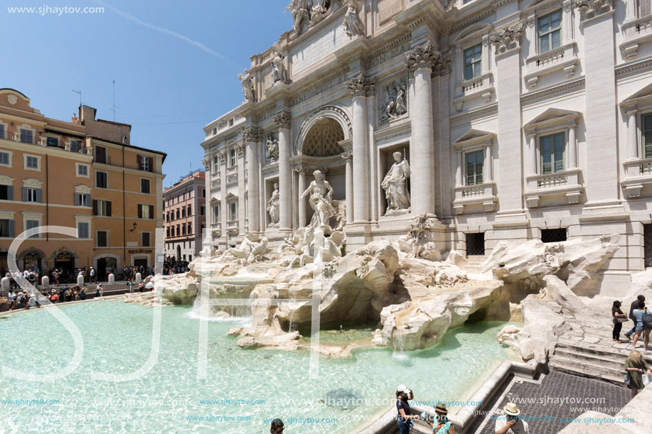 ROME, ITALY - JUNE 23, 2017: People visiting Trevi Fountain (Fontana di Trevi) in city of Rome, Italy