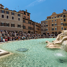 ROME, ITALY - JUNE 23, 2017: People visiting Trevi Fountain (Fontana di Trevi) in city of Rome, Italy