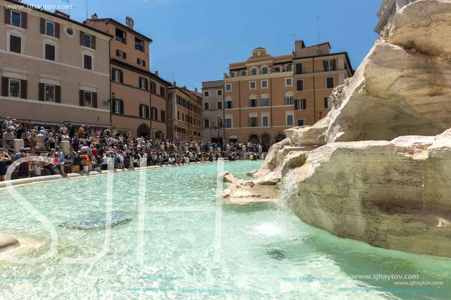 ROME, ITALY - JUNE 23, 2017: People visiting Trevi Fountain (Fontana di Trevi) in city of Rome, Italy