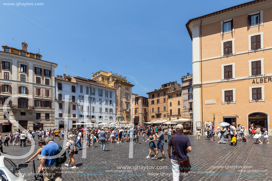 ROME, ITALY - JUNE 23, 2017: Tourists in front of Fountain in front of Pantheon in city of Rome, Italy