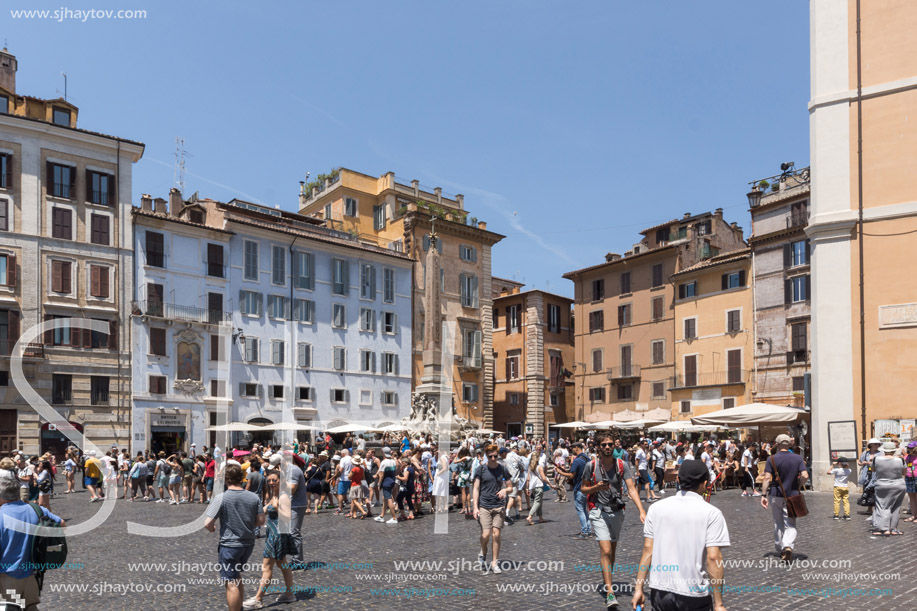 ROME, ITALY - JUNE 23, 2017: Tourists in front of Fountain in front of Pantheon in city of Rome, Italy