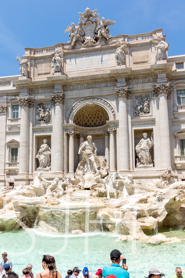 ROME, ITALY - JUNE 23, 2017: Tourists visiting Trevi Fountain (Fontana di Trevi) in city of Rome, Italy