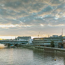 LONDON, ENGLAND - JUNE 18, 2016: Amazing sunset Cityscape from Millennium Bridge and Thames River, London, Great Britain