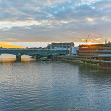 LONDON, ENGLAND - JUNE 18, 2016: Amazing sunset Cityscape from Millennium Bridge and Thames River, London, Great Britain