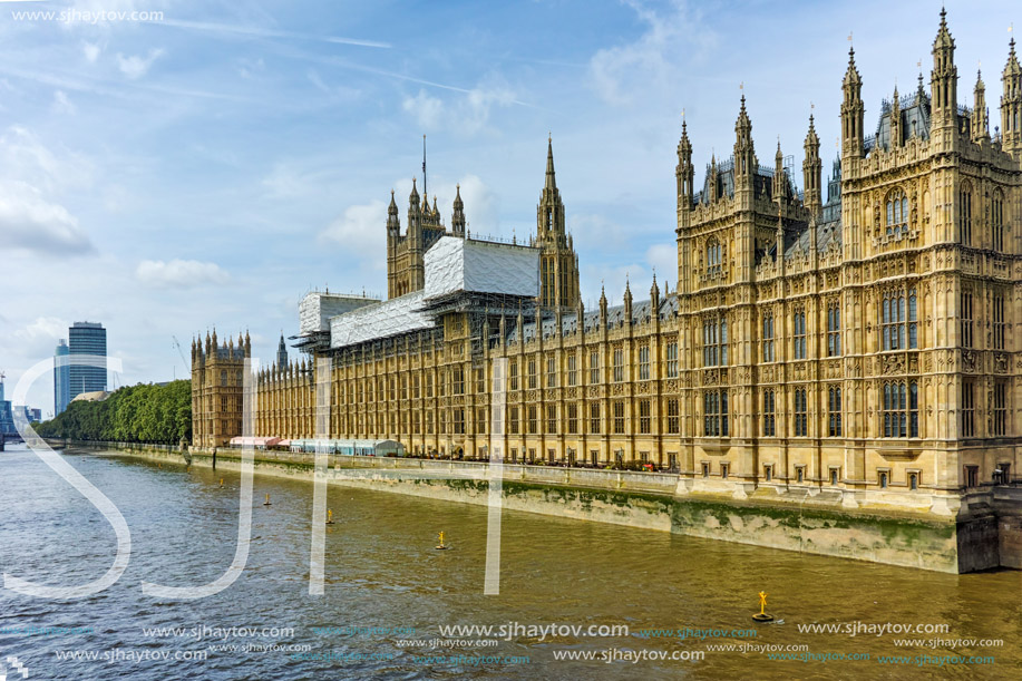LONDON, ENGLAND - JUNE 19 2016: Cityscape of Westminster Palace and Thames River, London, England, United Kingdom