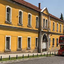 SKOPJE, REPUBLIC OF MACEDONIA - 13 MAY 2017:  A red double-decker bus passing through the streets of city of Skopje, Republic of Macedonia