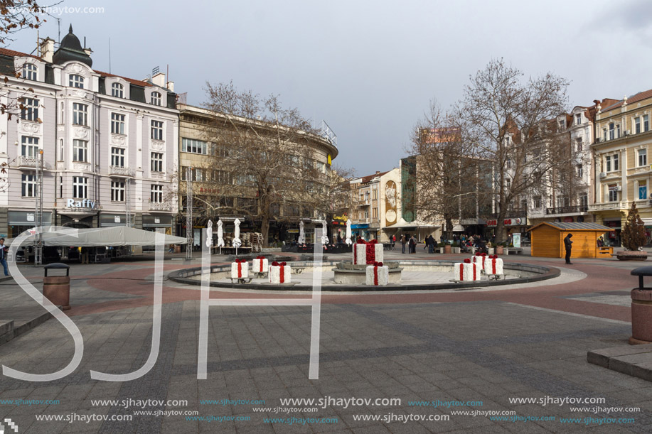 PLOVDIV, BULGARIA - DECEMBER 30, 2016:  Walking people and Houses at central street in city of Plovdiv, Bulgaria
