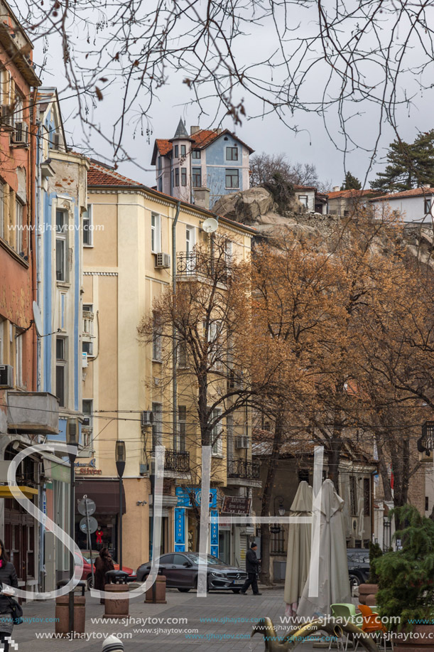 PLOVDIV, BULGARIA - DECEMBER 30, 2016:  Walking people and Houses at central street in city of Plovdiv, Bulgaria