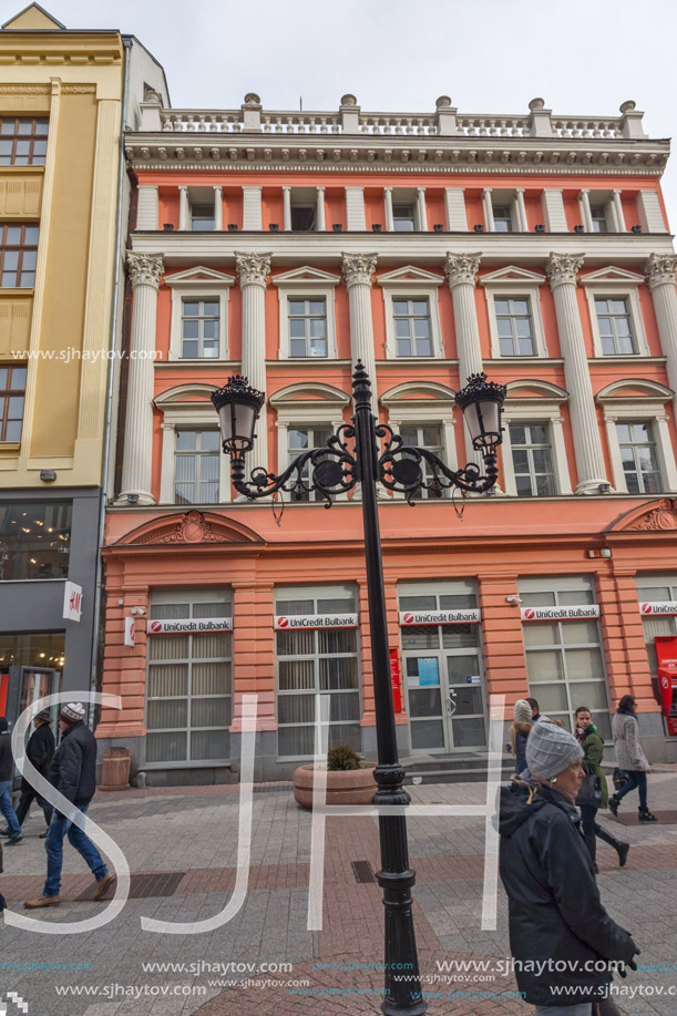 PLOVDIV, BULGARIA - DECEMBER 30, 2016:  Walking people and Houses at central street in city of Plovdiv, Bulgaria