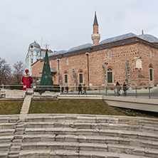 PLOVDIV, BULGARIA - DECEMBER 30, 2016:  Dzhumaya Mosque and Roman stadium in city of Plovdiv, Bulgaria