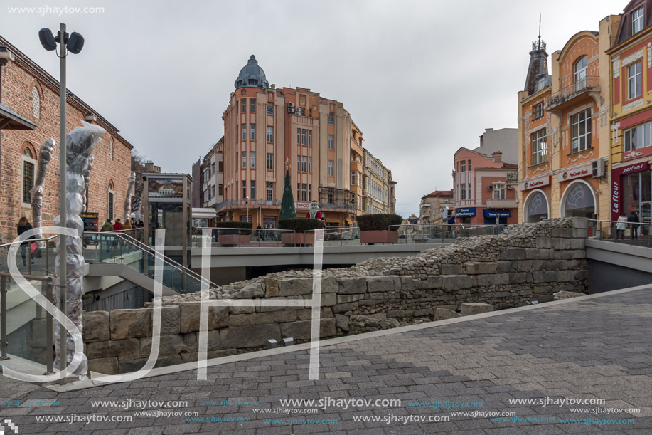 PLOVDIV, BULGARIA - DECEMBER 30, 2016:  Walking people and Street in district Kapana, city of Plovdiv, Bulgaria